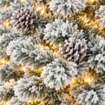 4.5 ft Prelit Flocked Artificial Christmas Tree with 250 Lights, 24 Pinecones, 498 PVC Tips, Snowy Hinged Tree and Metal Stand