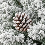 4.5 ft Flocked Artificial Christmas Tree with 21 Pinecones, 498 PVC Tips, Unlit Snowy Foliage, Hinged Branches and Metal Stand