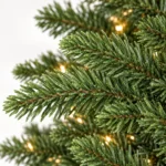 7 ft Prelit Artificial Christmas Tree with 750 Lights, Lush Green PE/PVC Foliage, 2,257 Tips, Hinged Branches and Metal Stand
