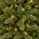 7 ft Prelit Artificial Christmas Tree with 750 Lights, Lush Green PE/PVC Foliage, 2,257 Tips, Hinged Branches and Metal Stand