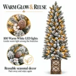 4 ft Prelit Flocked Potted Artificial Christmas Tree with 100 Multicolor LED Lights, Pinecones and Gold-Tone Decorative Planter