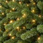 7.5 ft Prelit Artificial Christmas Tree with 450 Warm White LED Lights, Layered Green PE/PVC Foliage, 1,599 Tips and Metal Stand