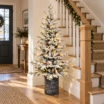 4.5 ft Flocked Artificial Potted Christmas Tree, 720 Tips, 150 Warm White Lights